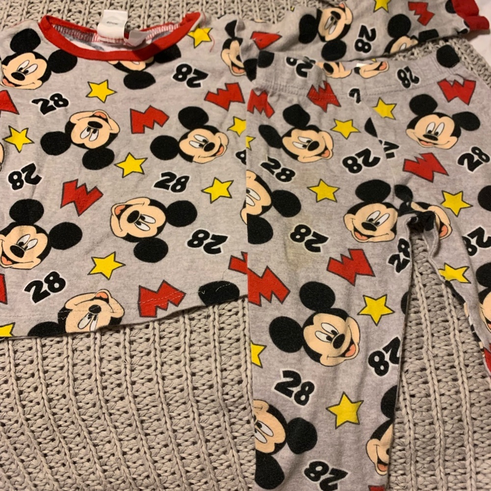 Two pairs of Toddler pajamas.